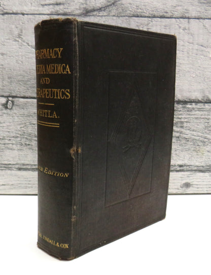 Elements of Pharmacy, Materia Medica, and Therapeutics by Sir William Whitla (Antique Medical Book,  book front cover
