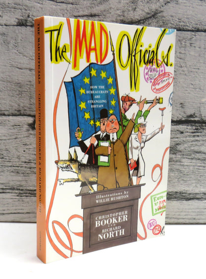 The Mad Officials By Christopher Booker and Richard North Illustrated By Willie Rushton 1994 book front cover